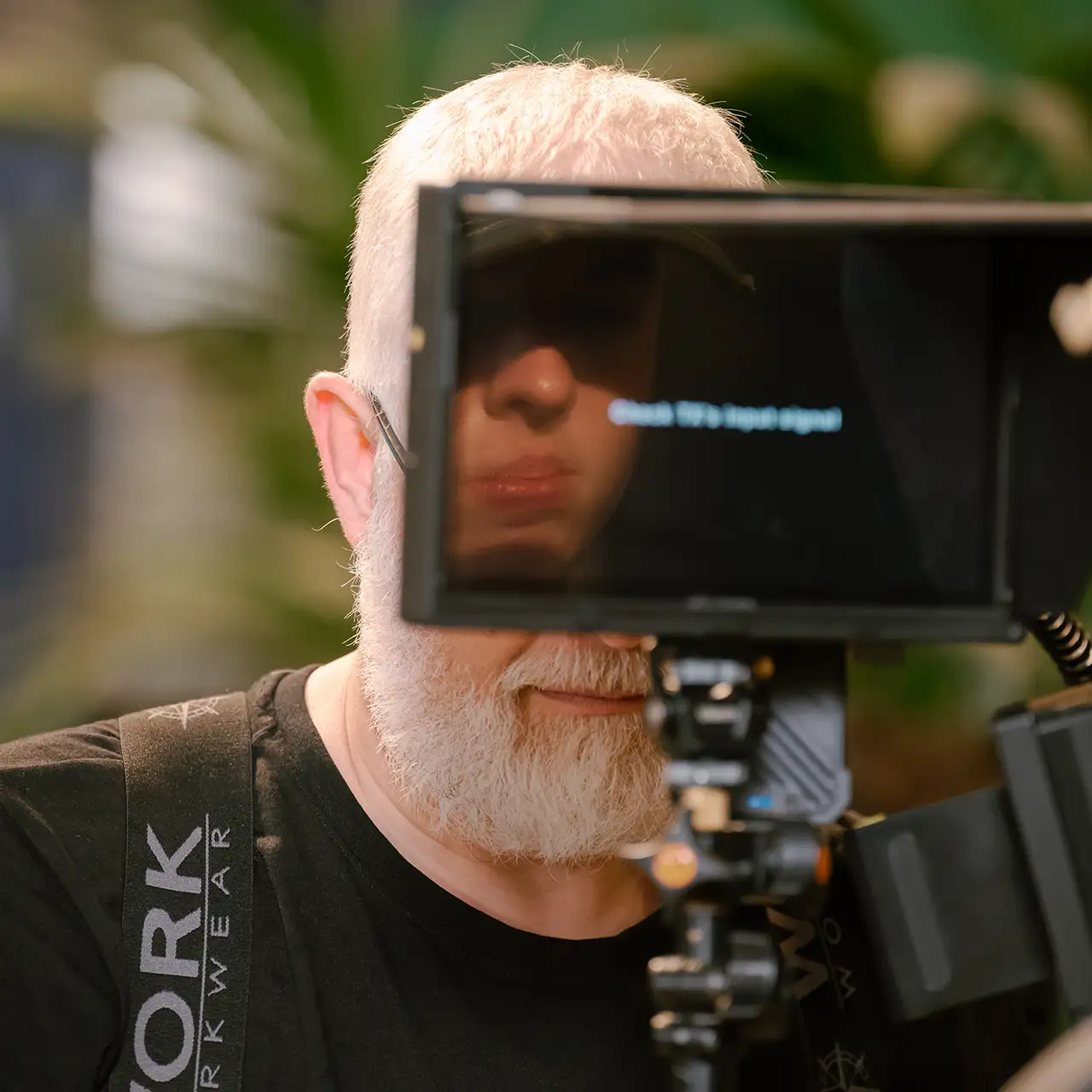 crew looking at monitor